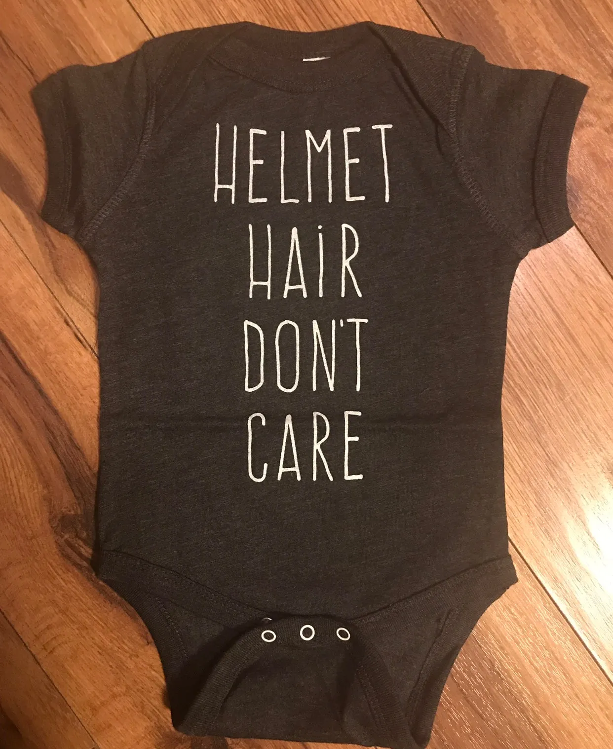 Helmet Hair Don’t Care T-shirt’s & Onsies