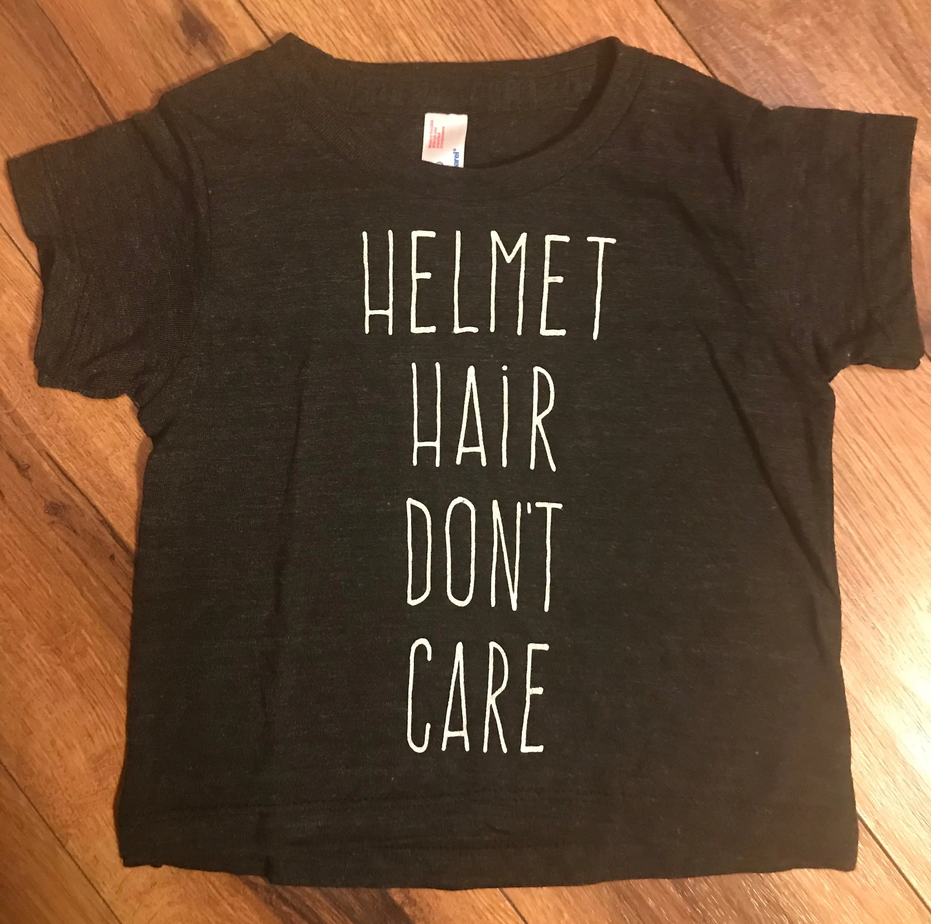 Helmet Hair Don’t Care T-shirt’s & Onsies